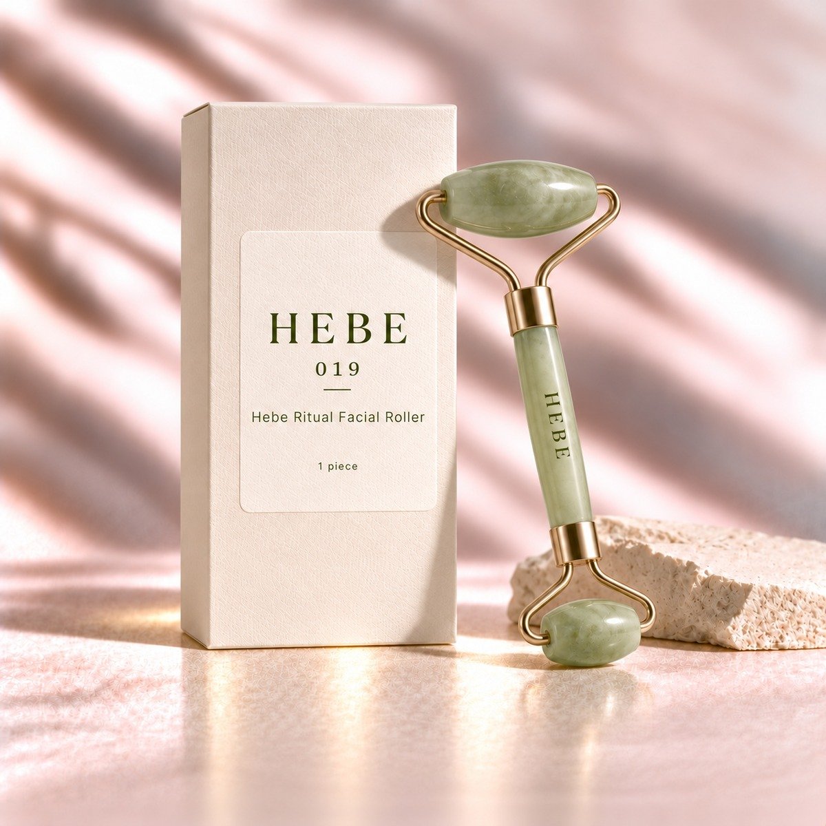 Hebe Ritual Facial Roller, 1 piece, stone roller with metal hardware.